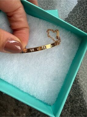 Tiffany atlas 18 k gold with dimonds